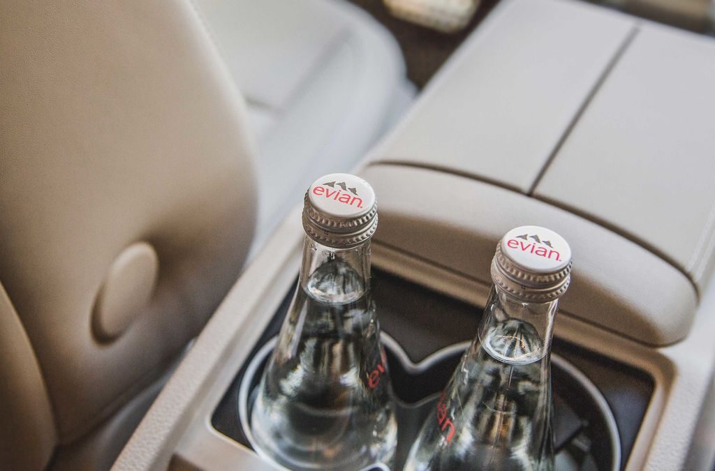 Bottled water in the rear console